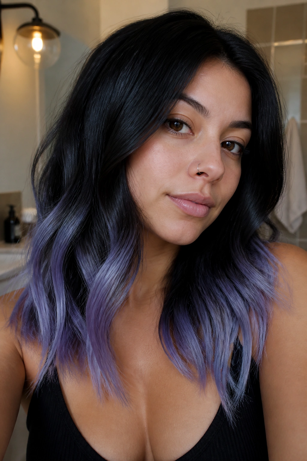 Close-up of real person with periwinkle dip ends on dark hair