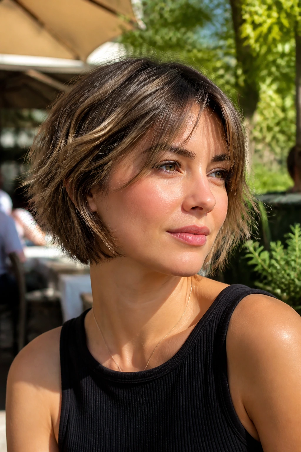 Close-up portrait of a real woman with a piecey bob micro layers