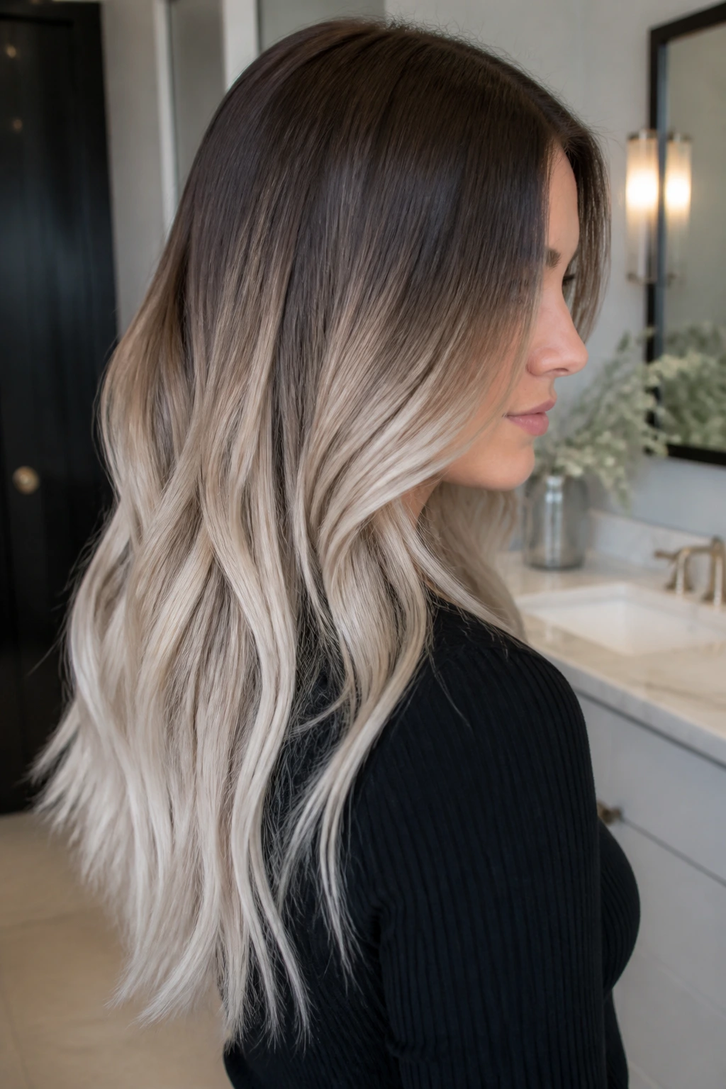 Close-up of long brown hair with platinum ash ends and brown roots