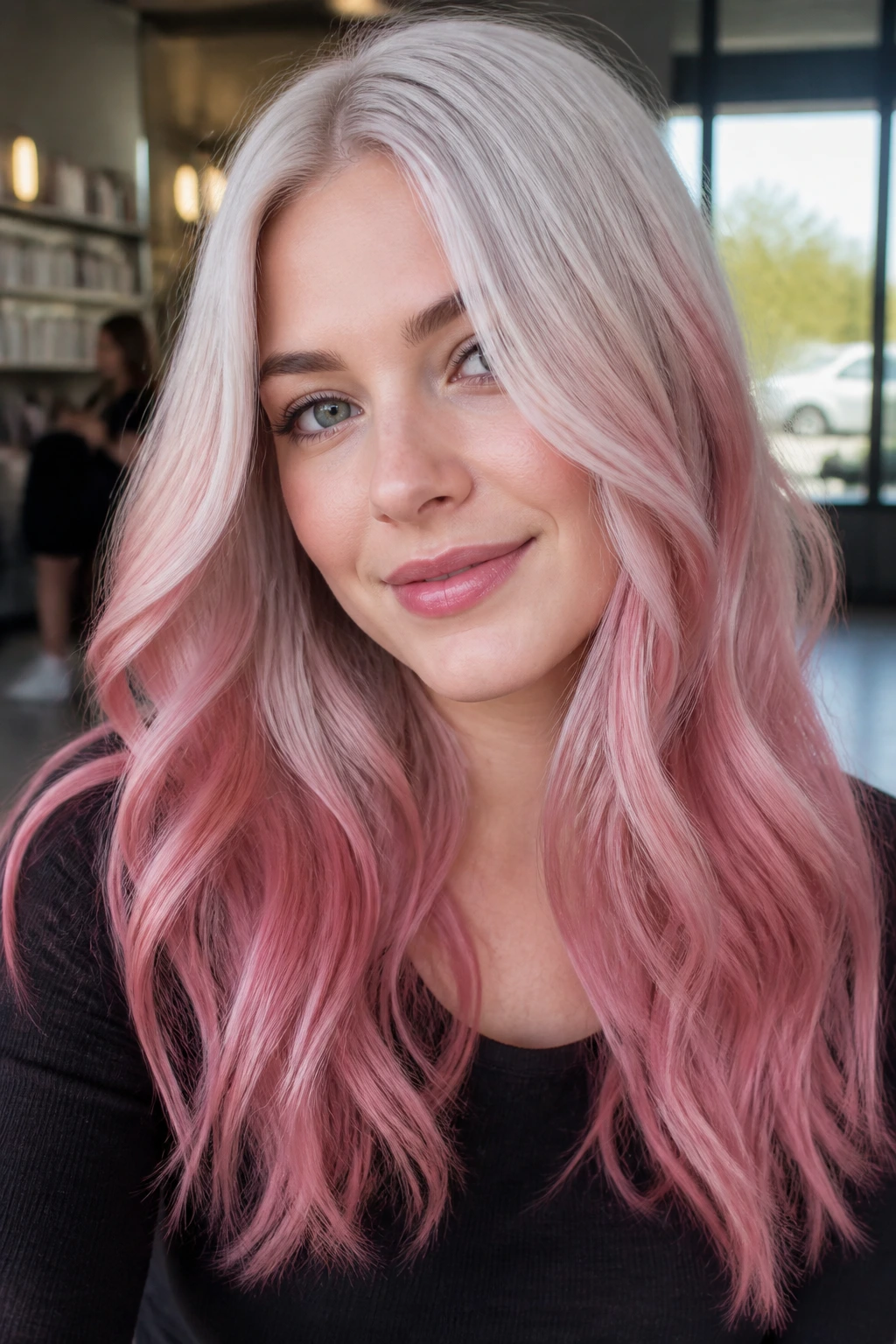 Hair gradient from platinum to rose on a cool-skinned person