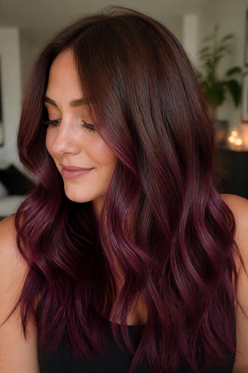 Close-up of a real woman with plum brown melt hair in natural light