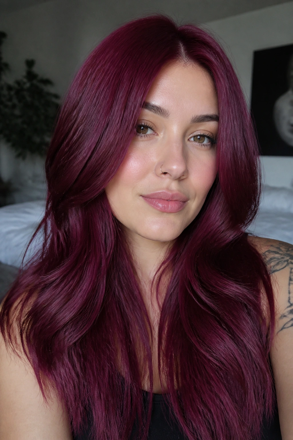 Close-up of cool raspberry burgundy hair on a real person