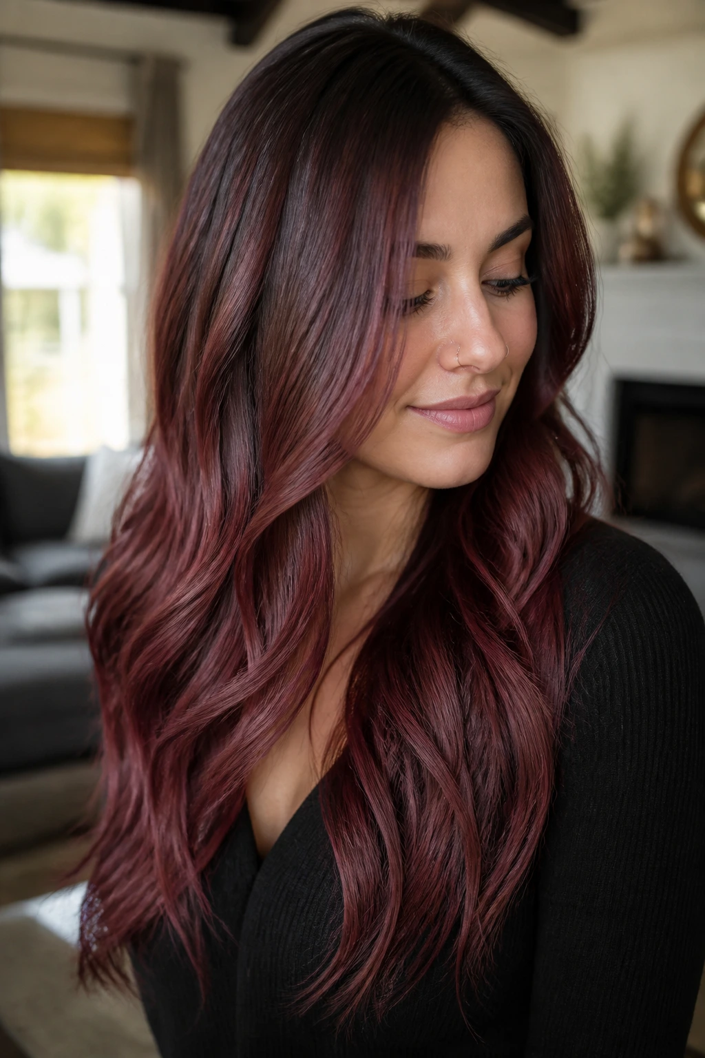 Close-up of rosewood burgundy melt hair with darker roots and translucent finish