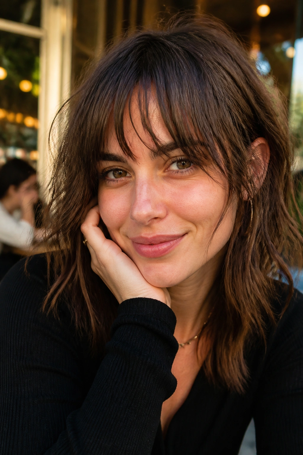 Portrait of a woman with shaggy piecey bangs