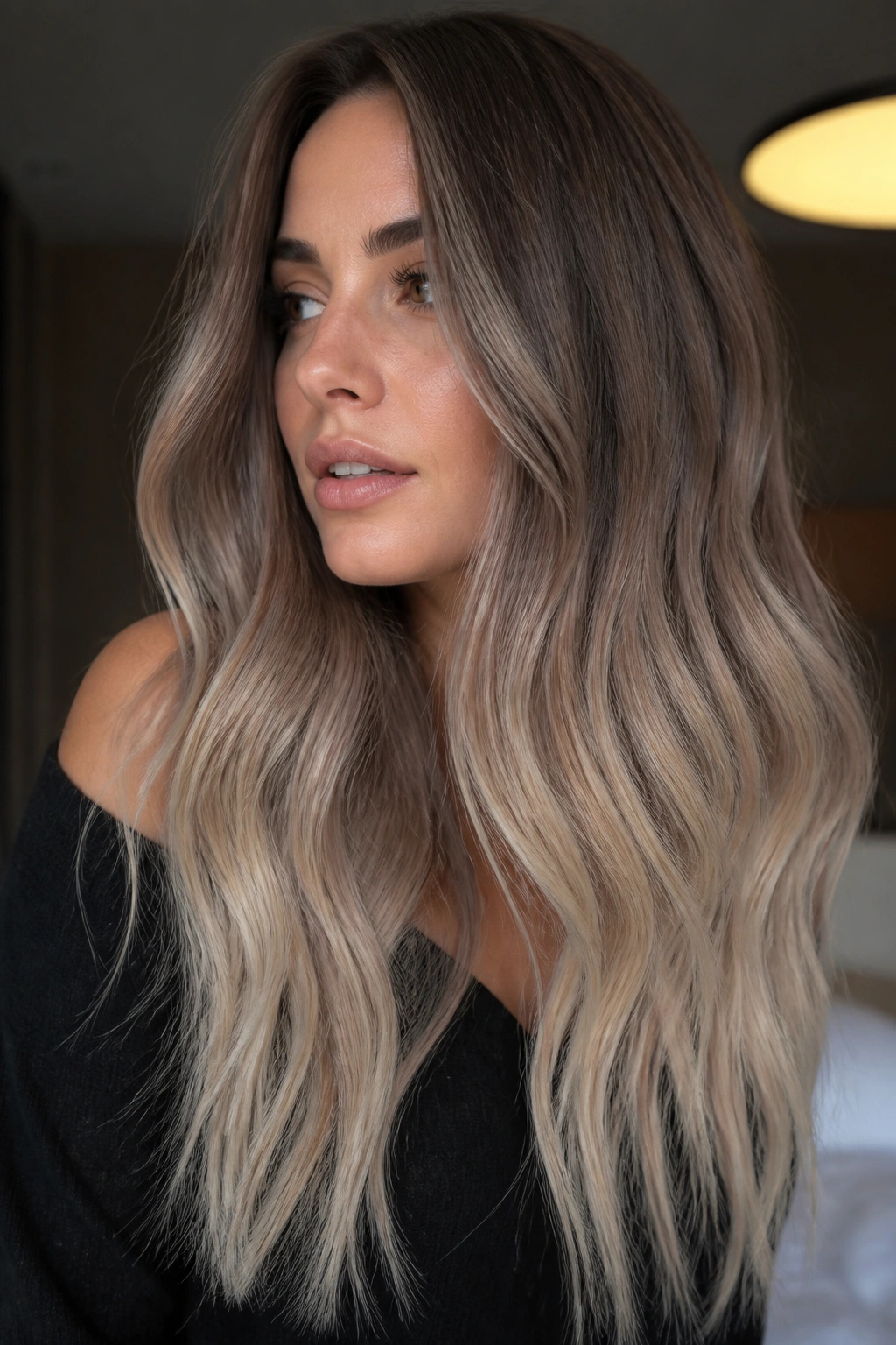 Close-up of smoked almond blonde ombre on a real woman