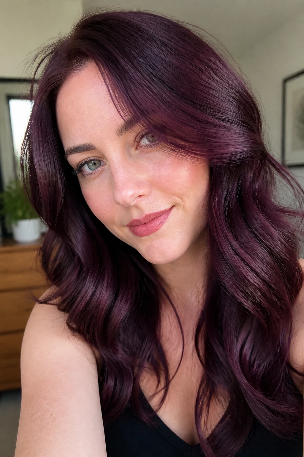 Close-up of real person with smoked orchid burgundy hair in natural light
