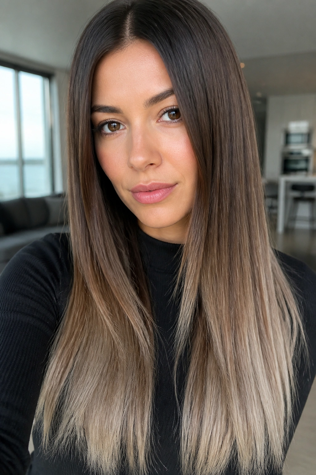 Close-up portrait of a real woman with smoky brown ombre on straight hair