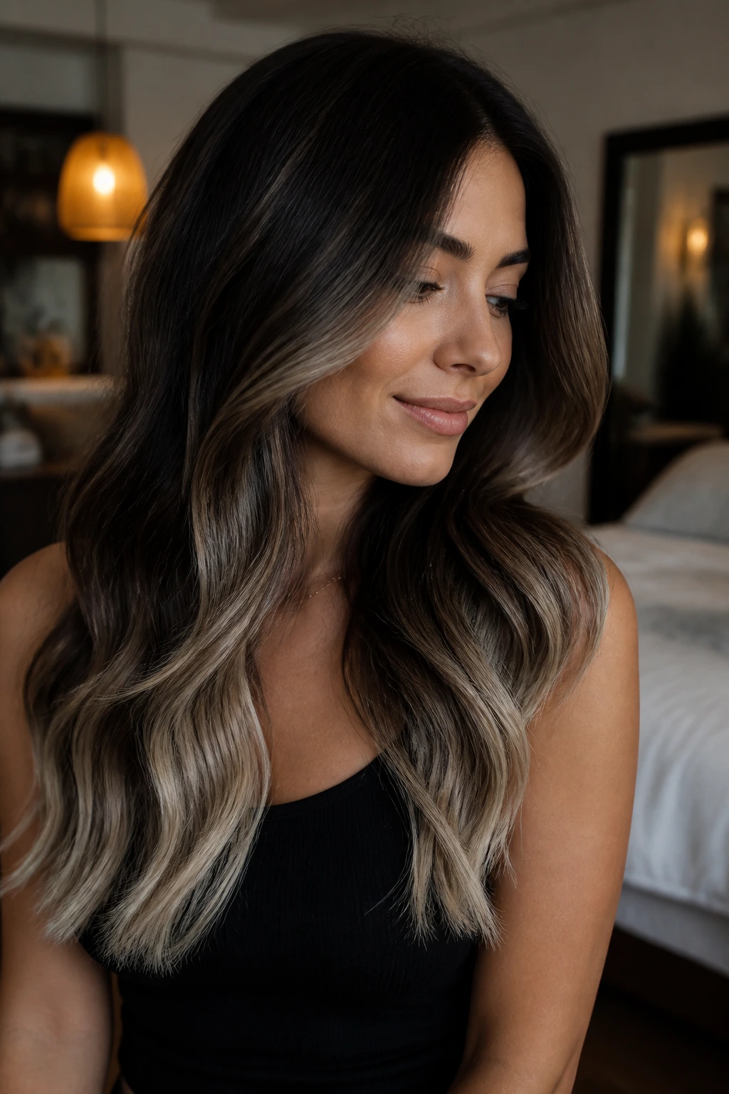 Close-up portrait of a real woman with smoky brunette and frosted tips