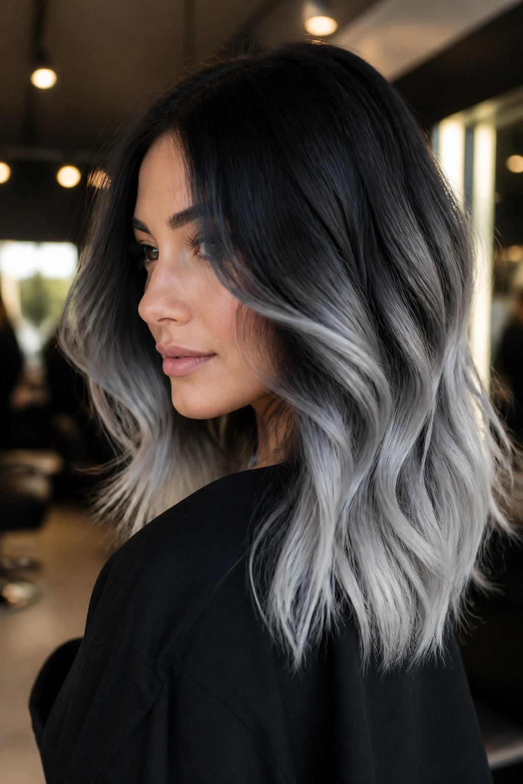 Close-up portrait of a real person with smoky charcoal melt hair