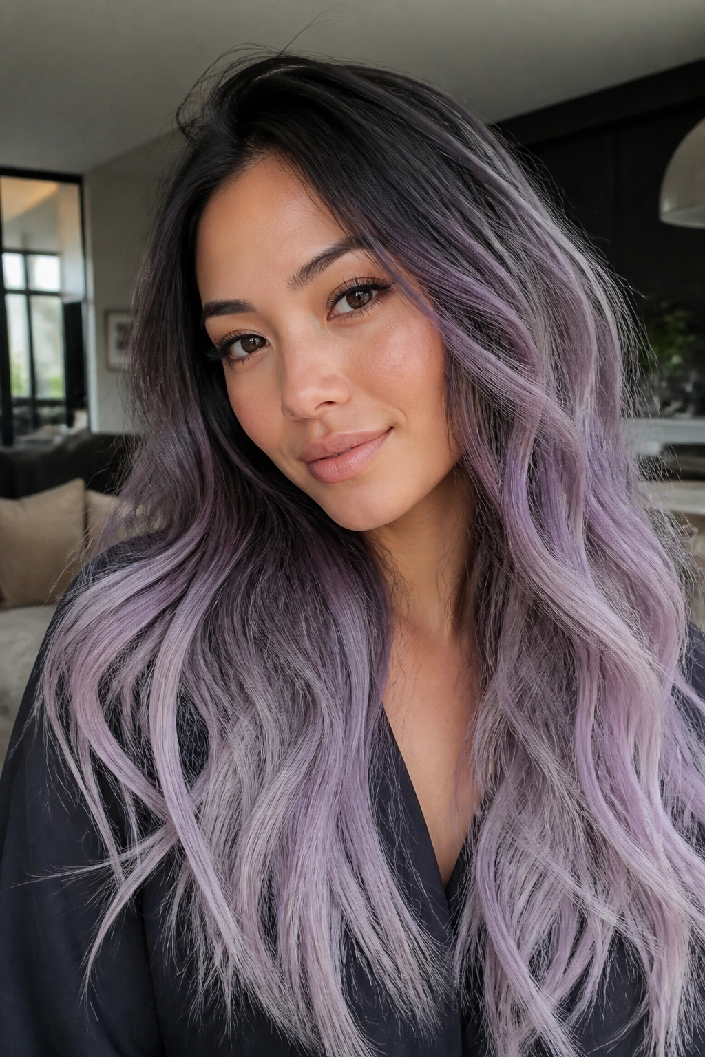 Close-up of a real woman with smoky root melt fading into silver lavender ends in long hair
