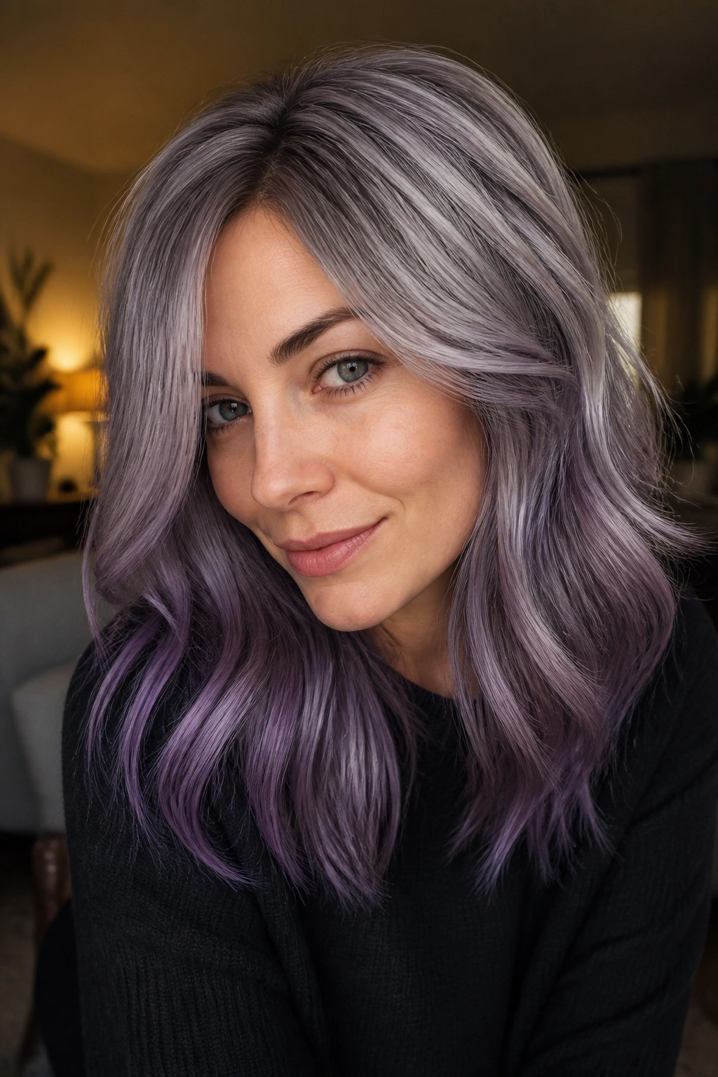Portrait of person with money-dimensional smoky violet hair with multiple tones.