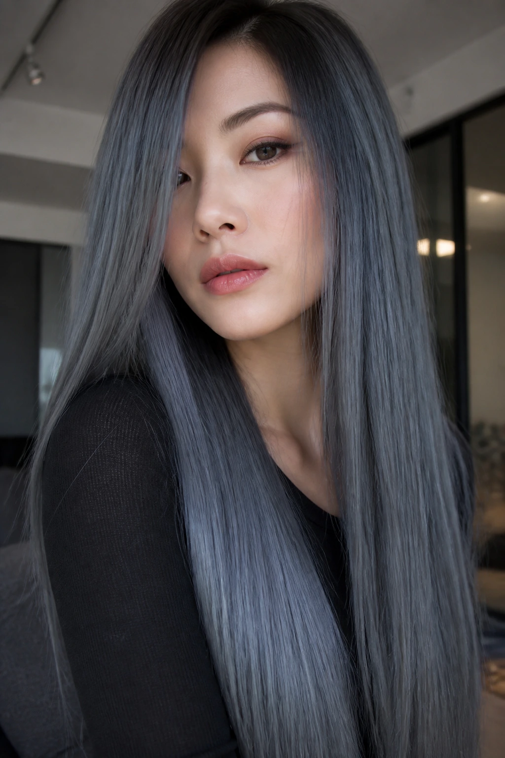 Close-up of long straight steel blue-gray hair on a real person