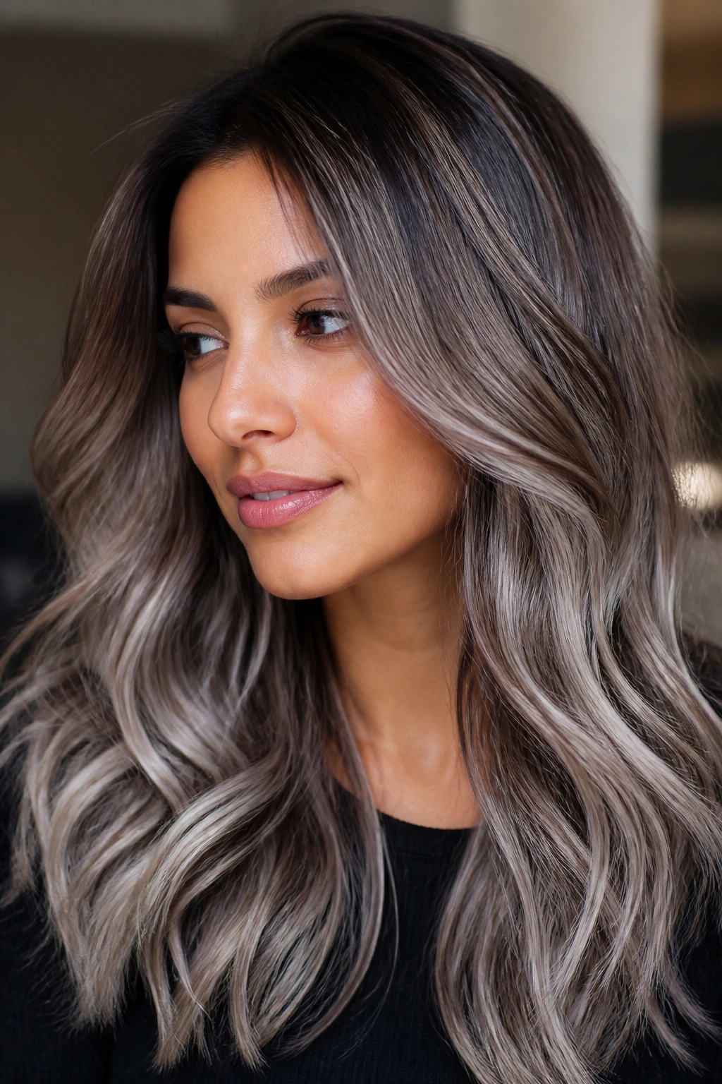 Taupe-gray balayage on brown hair with soft gray reflection