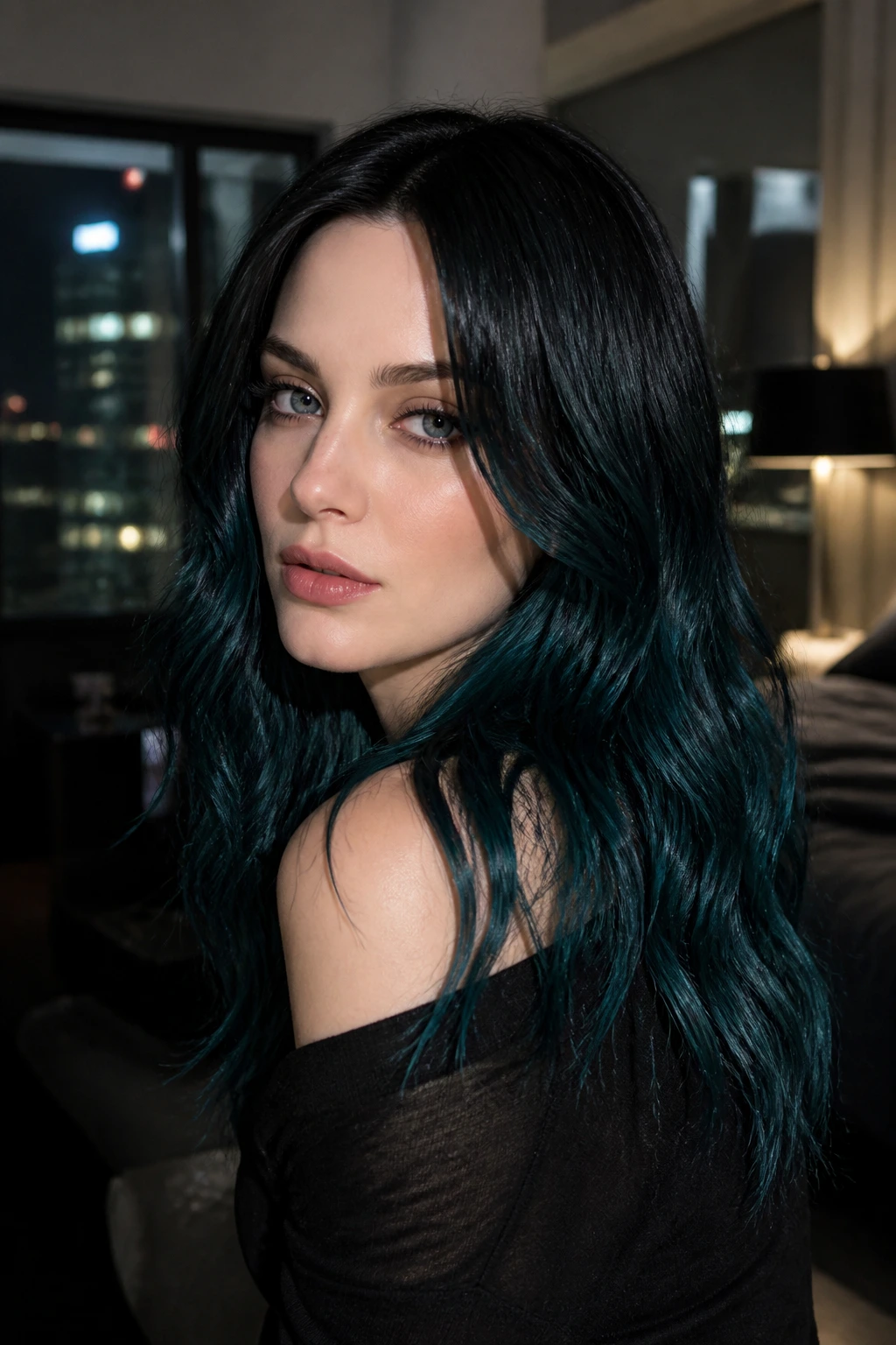 Close-up portrait of a real person with teal-black hair and cool skin in a dimly lit room