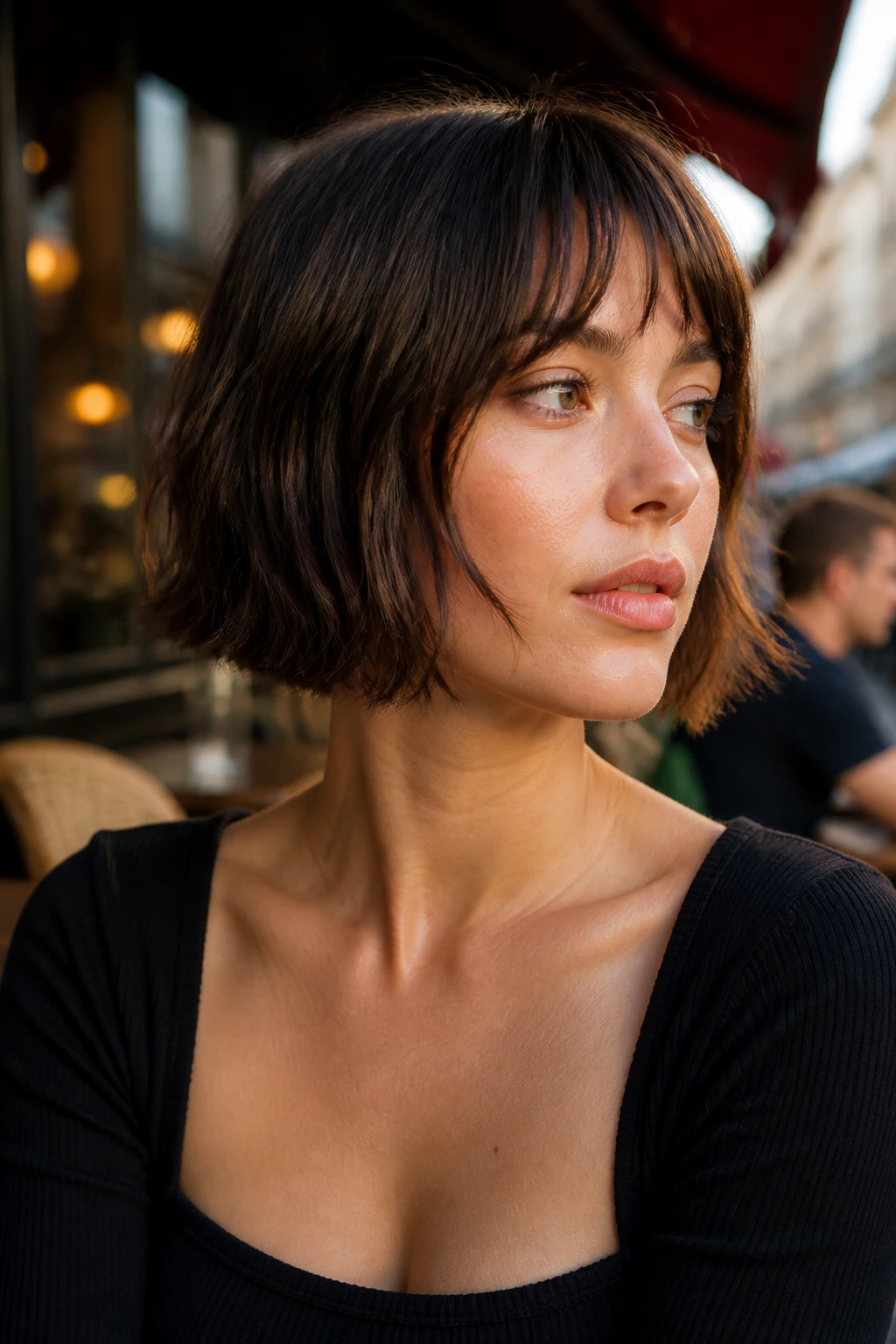 Close-up portrait of a real woman with textured French bob and choppy ends