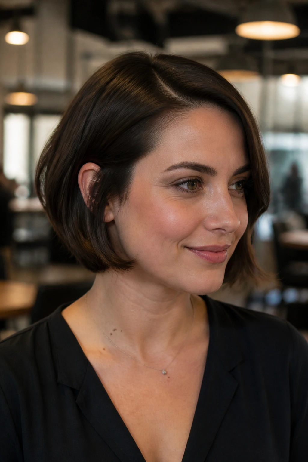 Real woman with tucked-under bob and clean side part