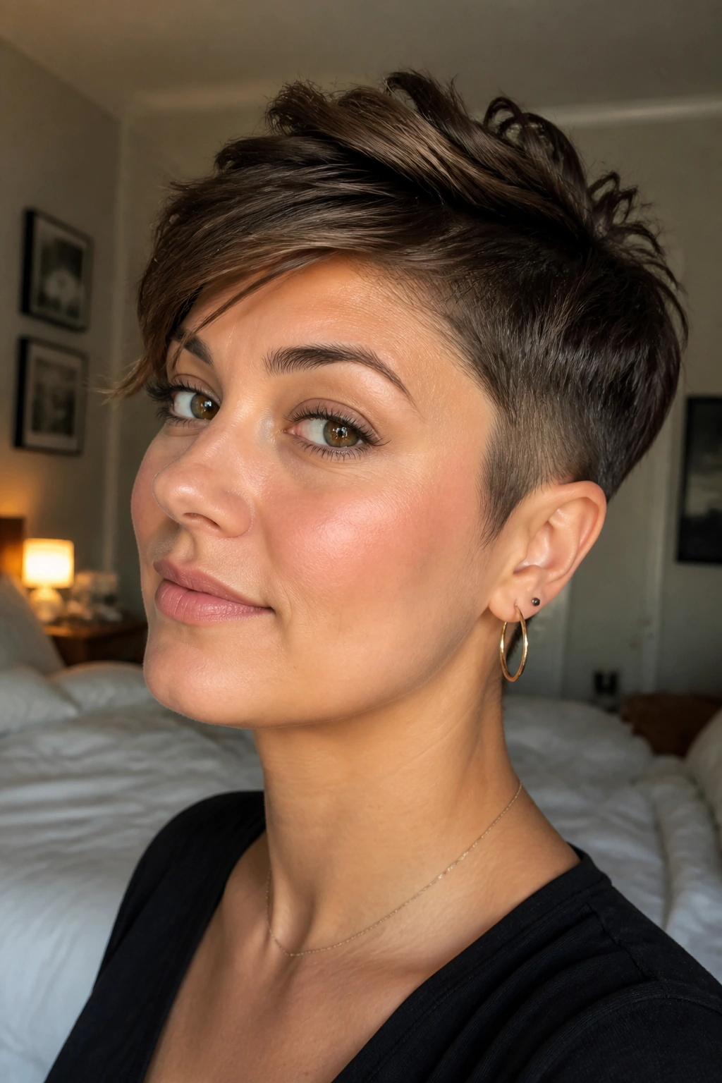 Close-up portrait of a real woman with a soft undercut pixie hairstyle