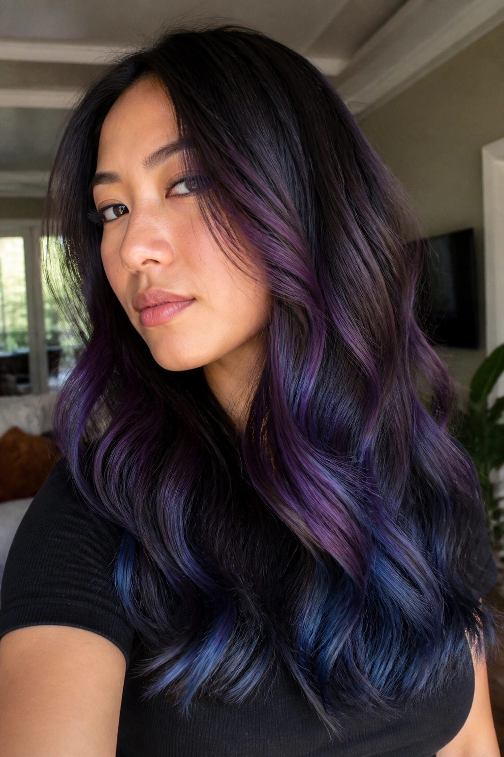 Close-up portrait of a real woman with violet melt on chocolate brown hair