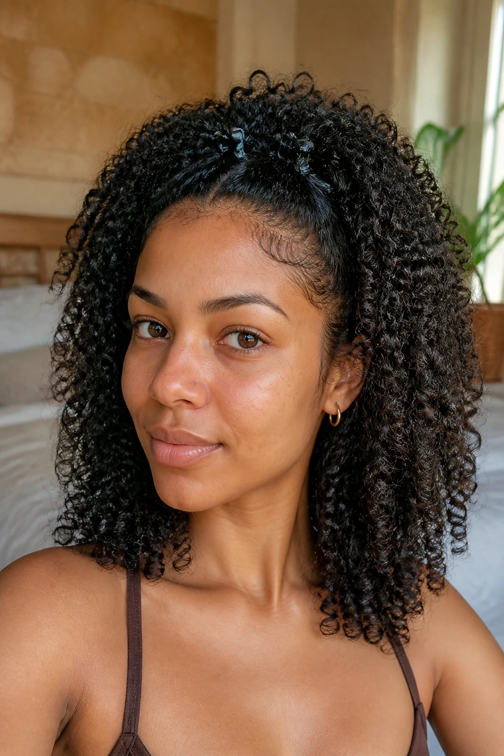 Close-up of a real woman with lift at roots from root clipping for a wash-and-go