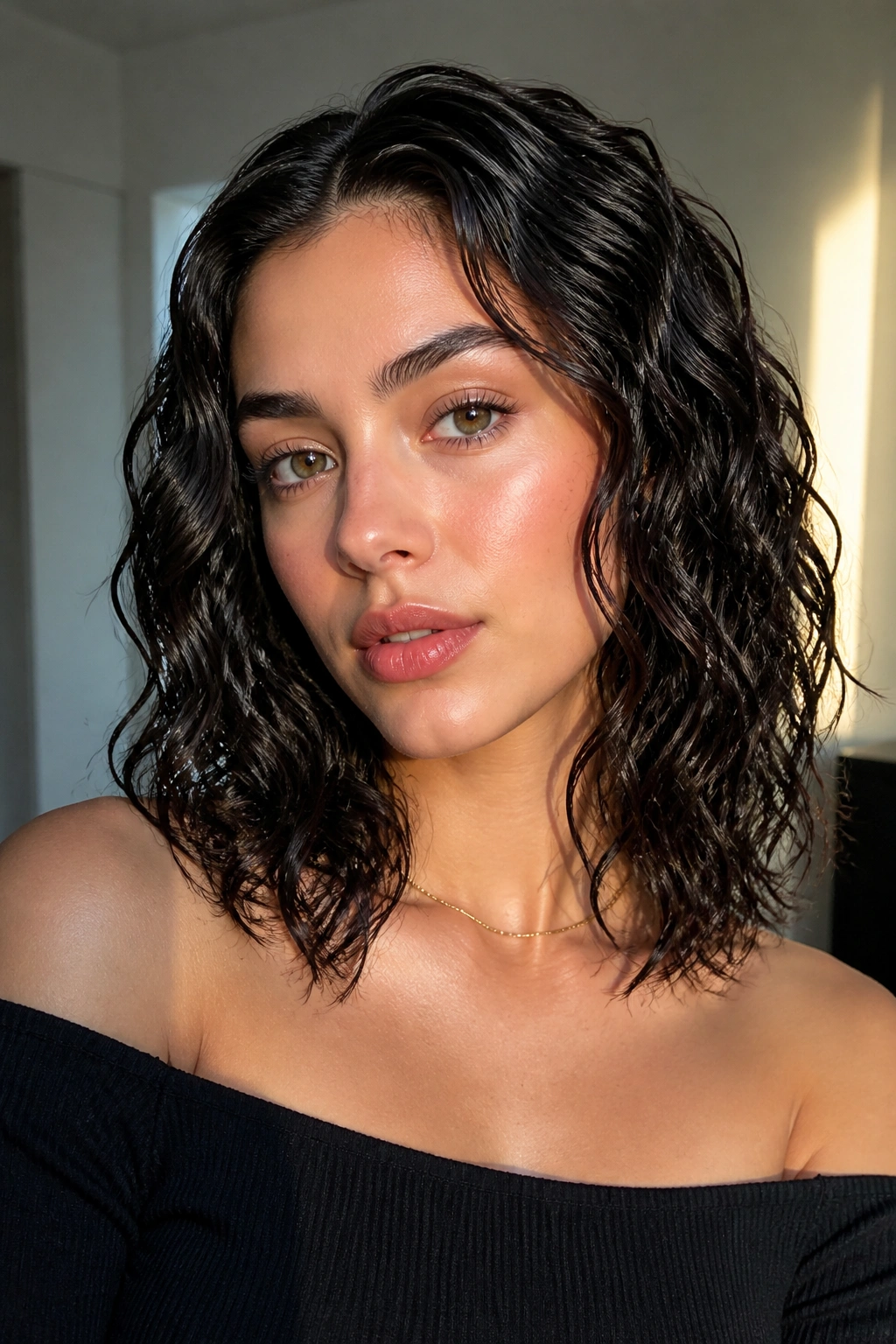 Close-up of a real person with glossy wet-look waves