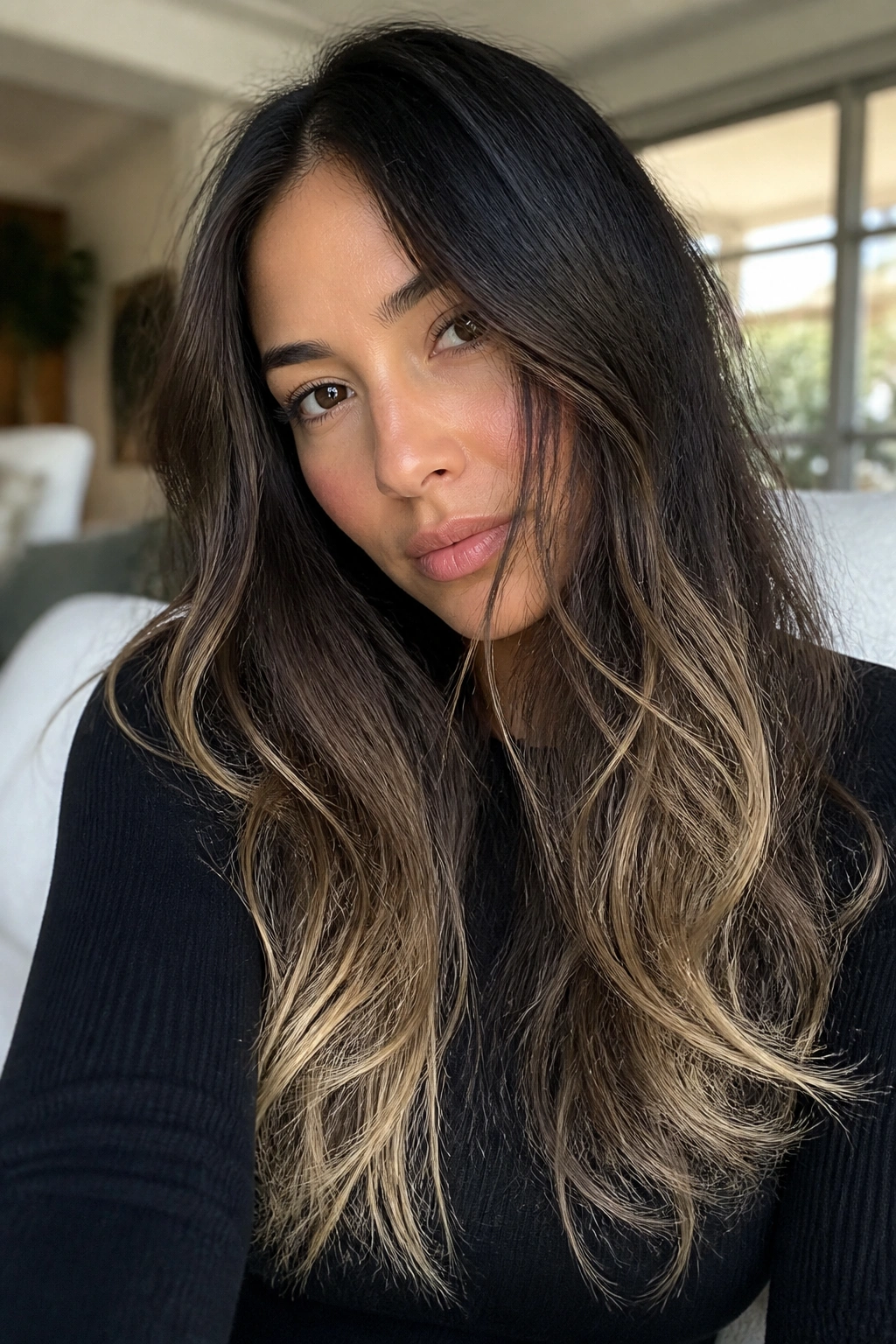 Real person with long hair featuring wispy blonde ends